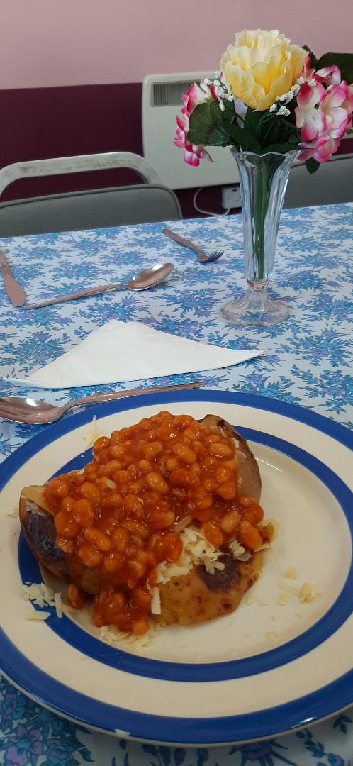 Photo of lunch Jacket potato , cheese and beans